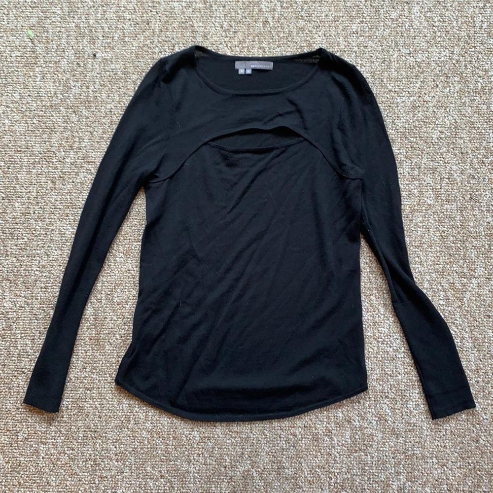 Black long sleeve top with cut out on front